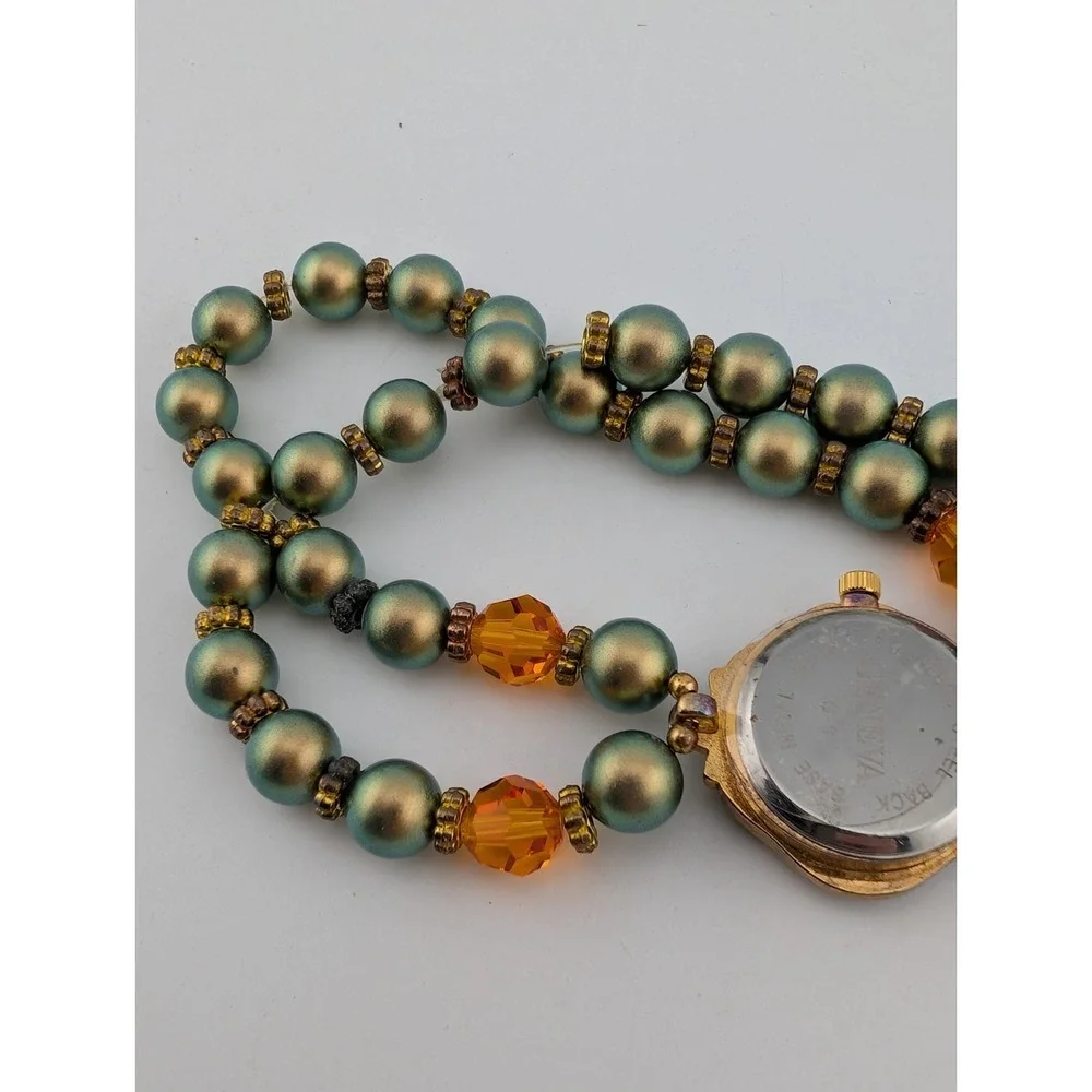 Geneva Watch Women 25mm Case Green & Orange Beaded Stretch Band- New Battery